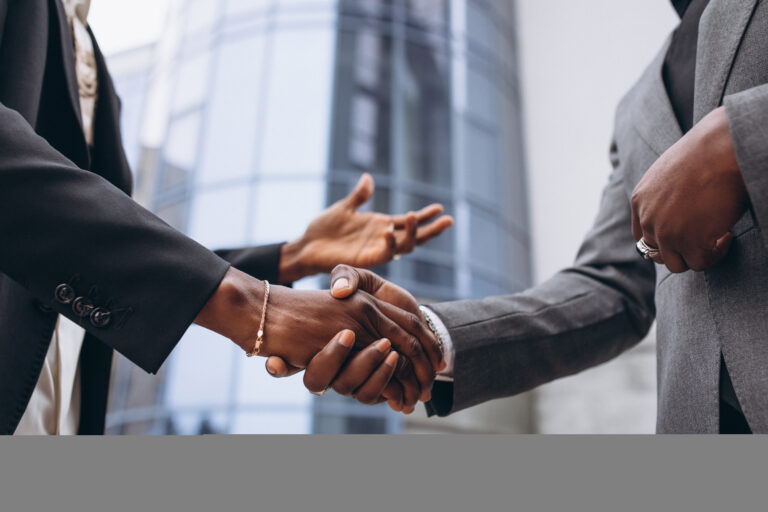 African business male people shaking hands